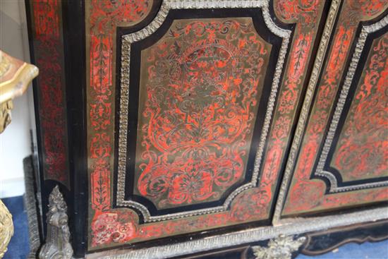 A mid 19th century French red boulle work and ebony bookcase, W.4ft 1in. D.1ft 6in. H.7ft 10in.